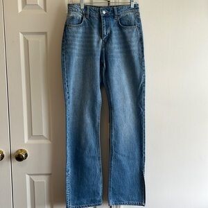 Straight leg jeans with bottoms slit